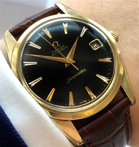 omega seamaster gold black dial 1950|omega seamaster 120 vintage price.